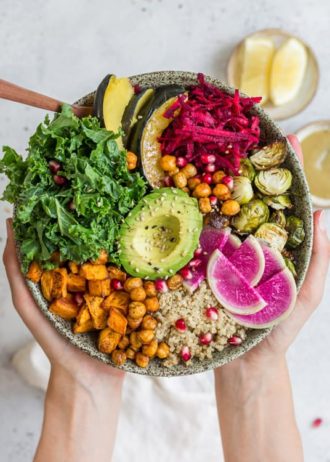 This healthy vegan fall harvest buddha bowl recipe is loaded with nourishing ingredients like sweet potato and chickpeas! Enjoy this healthy bowl for lunch or dinner!