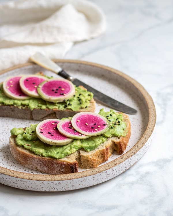 This smashed avocado toast with watermelon radish is a simple and delicious breakfast that only takes 5 minutes to make!