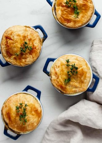 veggie pot pies in blue casserole dishes