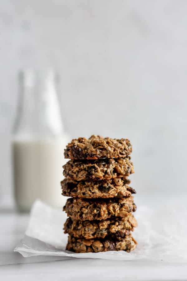 a stack of 6 breakfast cookies on a piece of parchment paper