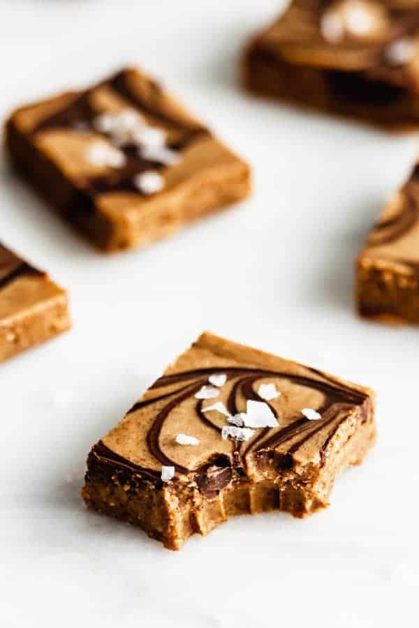 Salted almond butter fudge with a bite taken out of it 