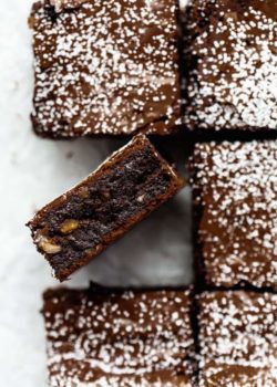 a chocolate hazelnut brownie topped with powdered sugar
