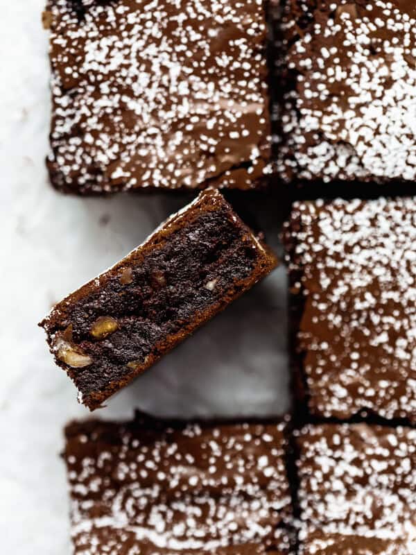 a chocolate hazelnut brownie topped with powdered sugar