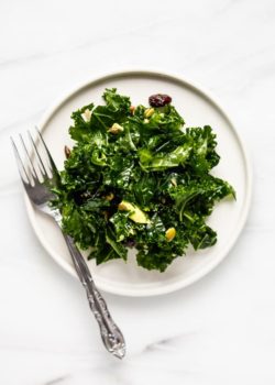 massaged kale salad recipe on a plate