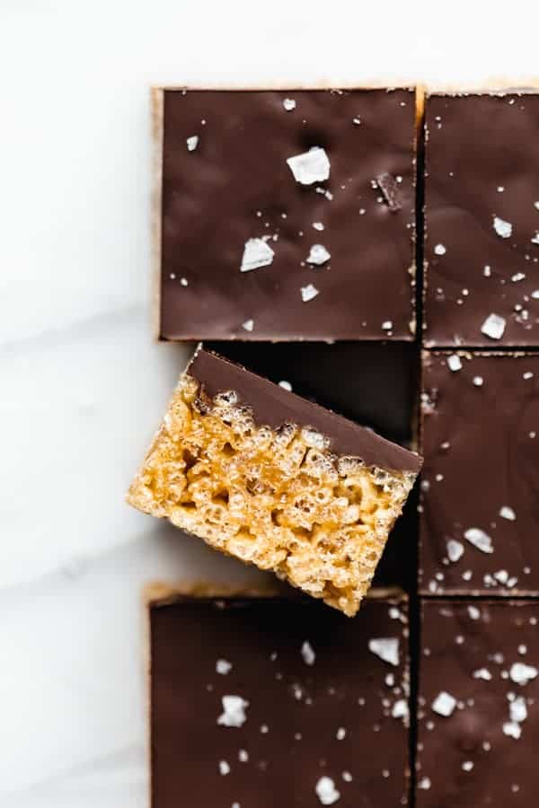 rice crispy treat with chocolate on a marble board