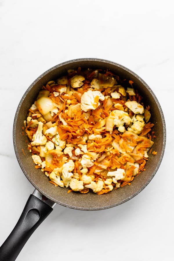 carrots and cauliflower in a pan
