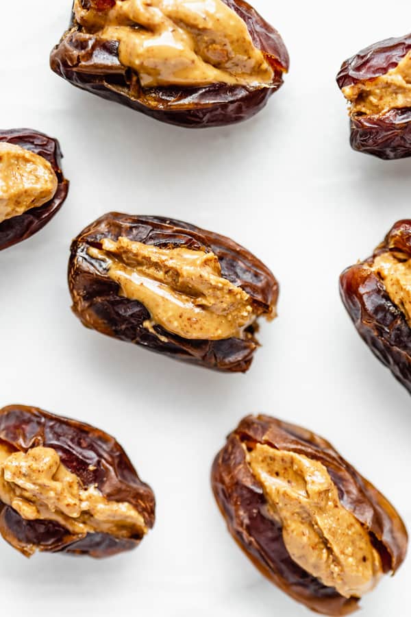 dates with almond butter in the centre