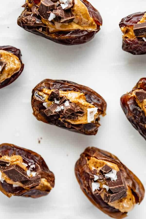 dates stuffed with almond butter and topped with chocolate and sea salt