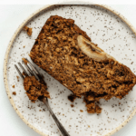 a plate with a slice of banana bread