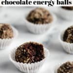 a chocolate energy ball with a bite taken out of it