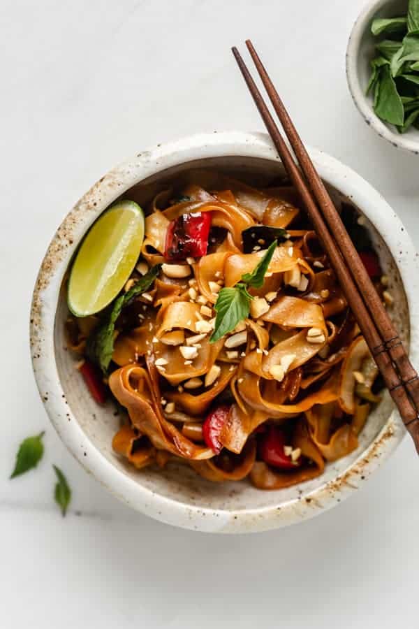 drunken noodles in a white ceramic bowl