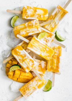 mango lassi popsicles stacked on top of each other