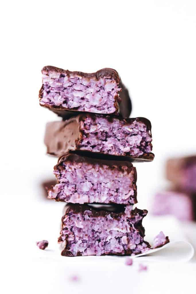 a stack of 4 blackberry coconut bars