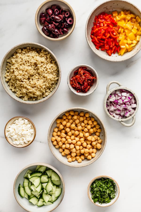 flat lay of salad ingredients in small bowls