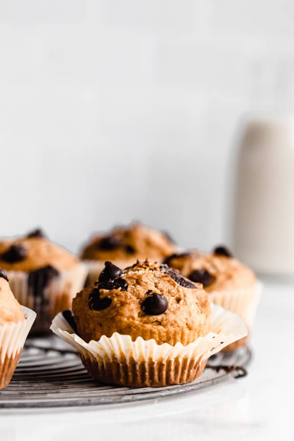 pumpkin chocolate chip muffins on a cooling rack