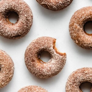 vegan apple cider donuts on a marble board