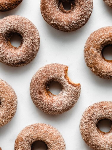 vegan apple cider donuts on a marble board