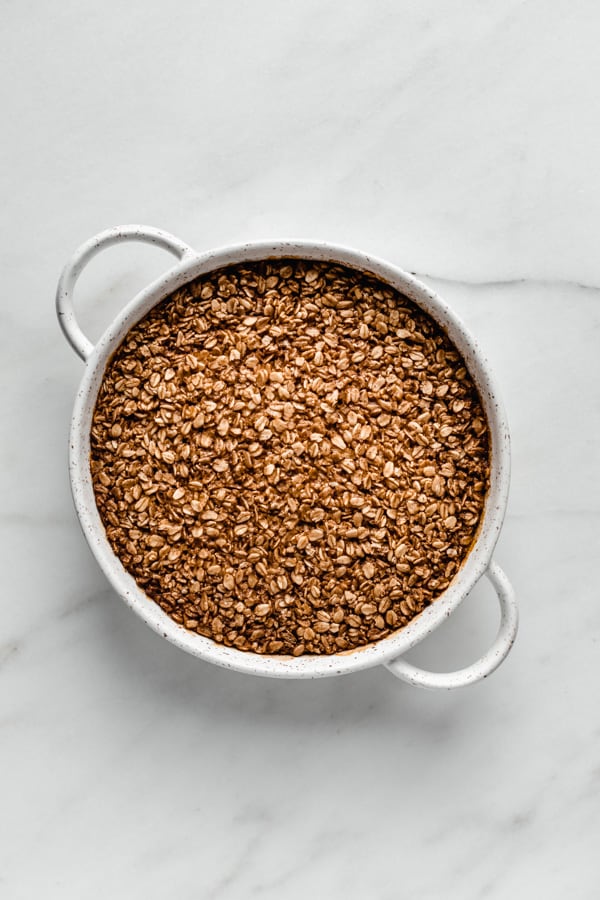 cooked baked oatmeal in a round baking dish