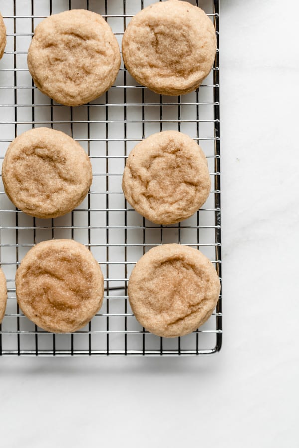 snickerdoodle cookies on a metal cooling rack