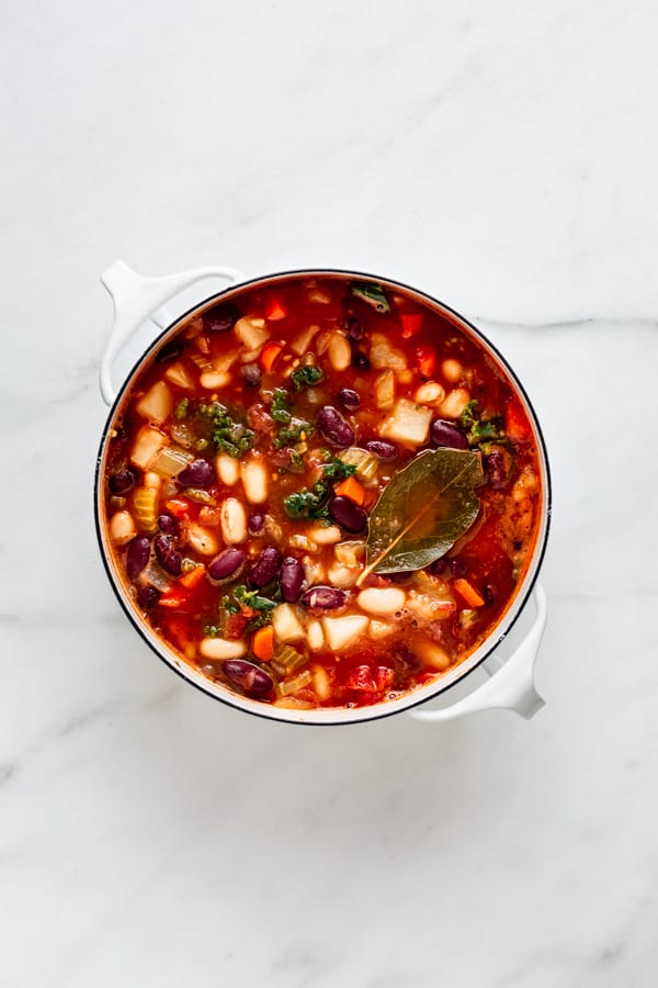 A pot filled with vegan minestrone soup