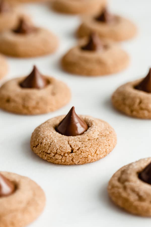peanut butter blossom cookies on a marble board