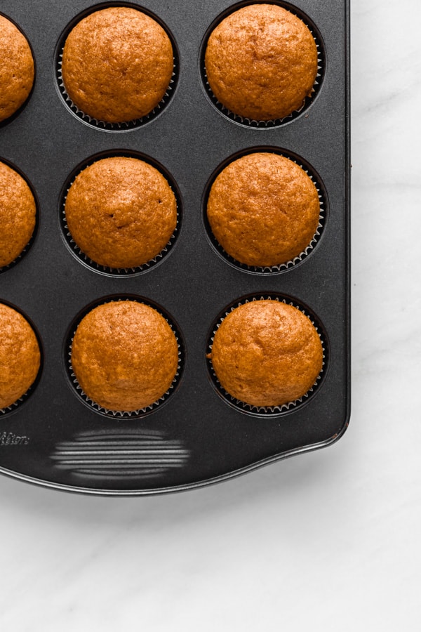 pumpkin cupcakes in a cupcake pan