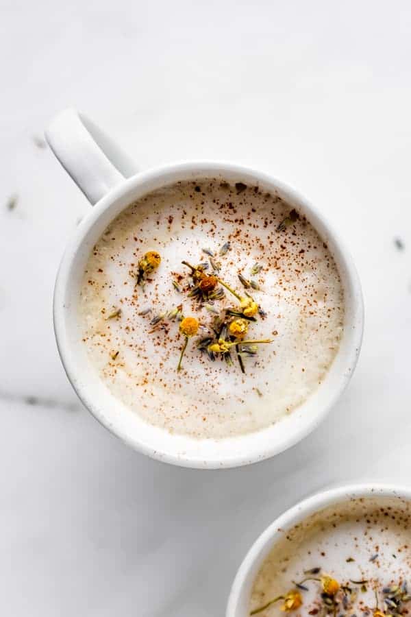 A lavender London fog topped with camomile flowers and lavender