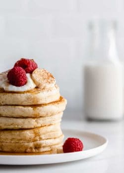 a close up view of a stack of pancakes