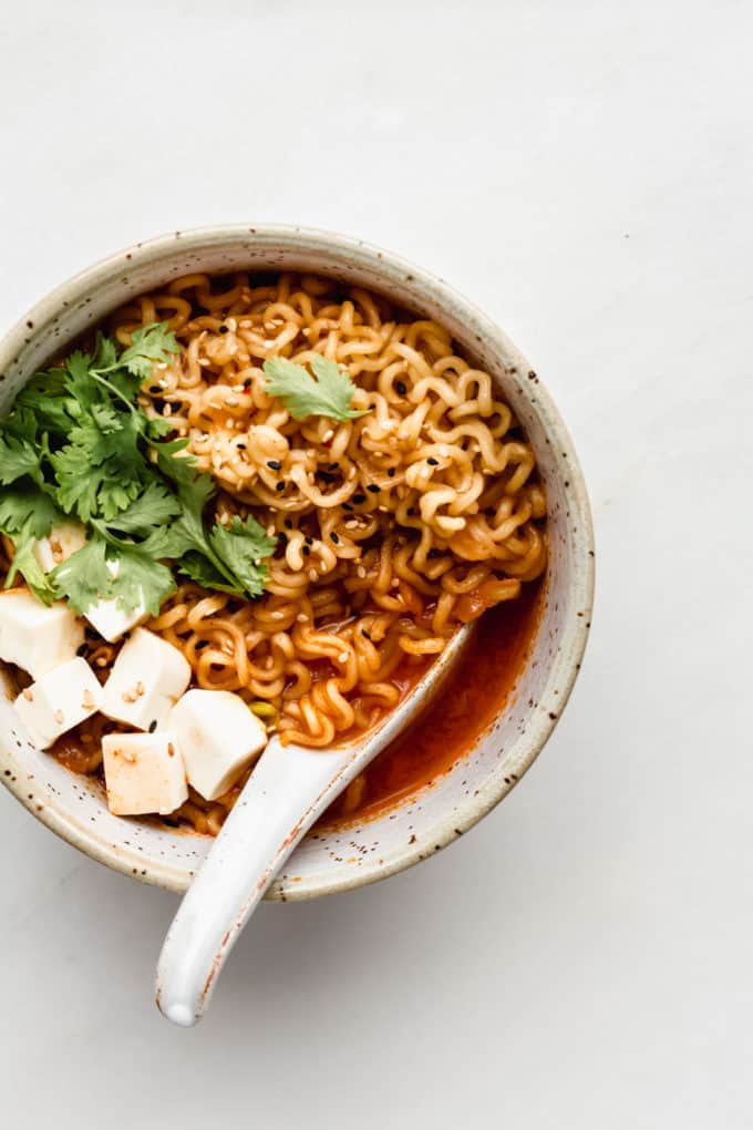 kimchi ramen in a bowl with noodles and tofu