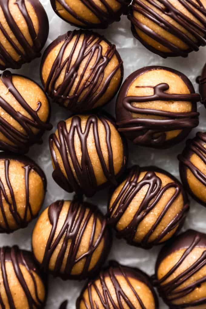 peanut butter balls drizzled with dark chocolate
