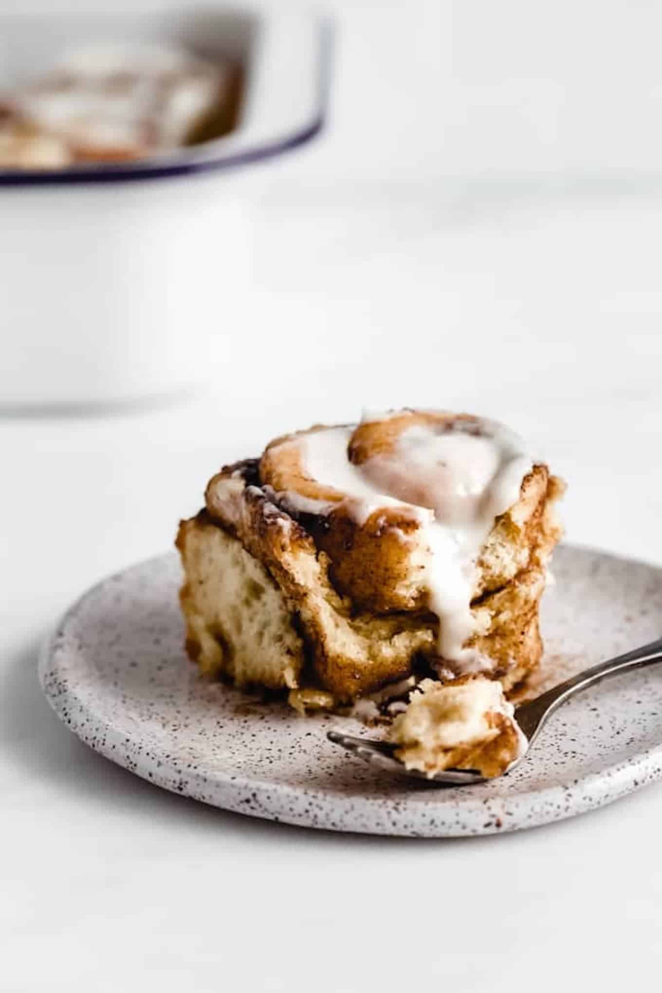 a fluffy and doughy vegan cinnamon roll for a plant-based thanksgiving breakfast