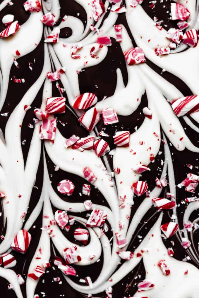 a close up of marbled dark chocolate and white chocolate peppermint bark