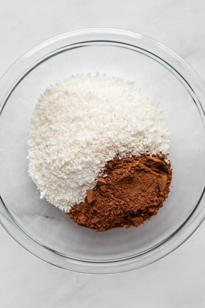 shredded coconut and cocoa powder in a mixing bowl