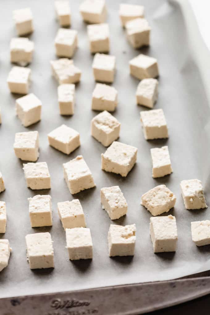 cubes of tofu on a baking sheet