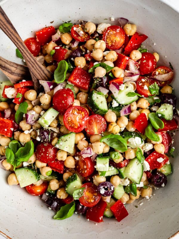 Mediterranean Chickpea Salad tossed in a bowl