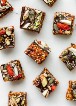 superfood energy squares on a marble board