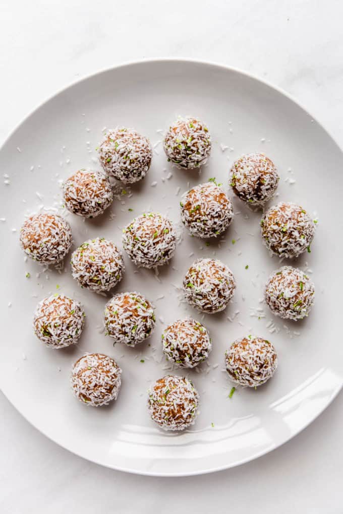 key lime pie energy balls on a white plate