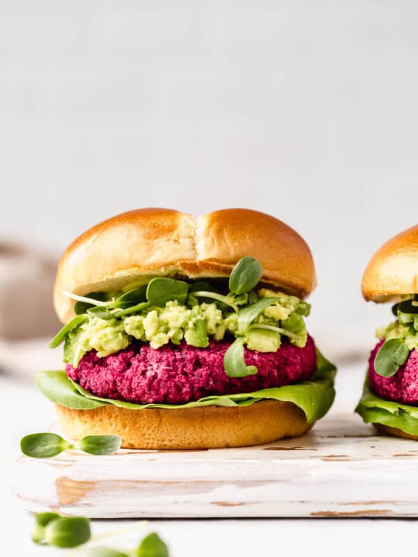 beet burgers on a white wooden serving board