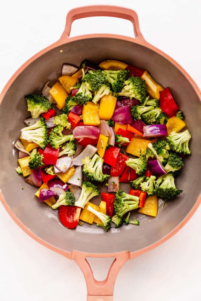 broccoli, peppers and onions and a pan