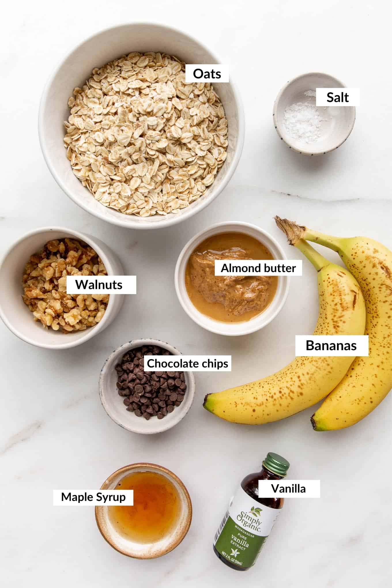 A flat lay of ingredients to make oatmeal banana cookies