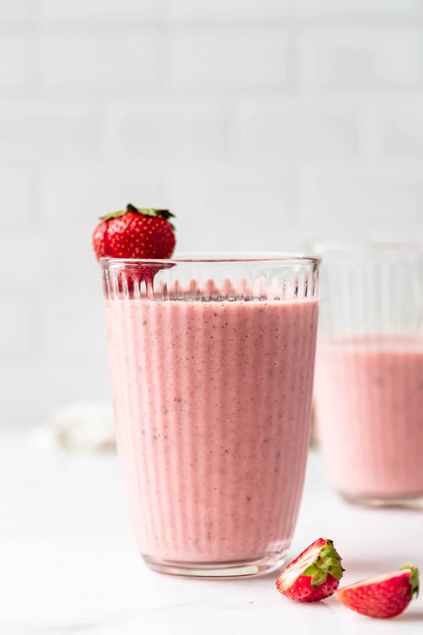 A strawberry chia seed smoothie in a glass