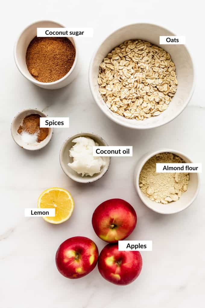 A flat lay of ingredients for healthy apple crisp