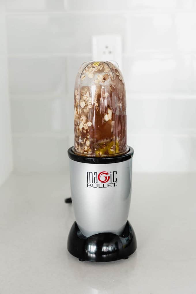 A magic bullet with ingredients in it to make baked oats