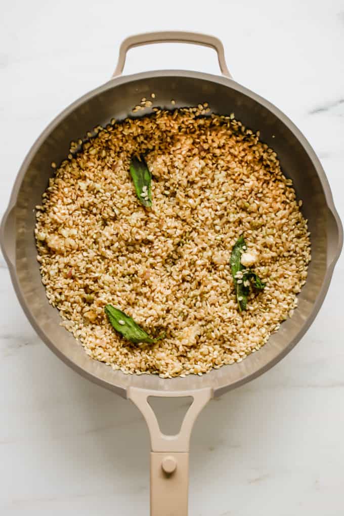 rice and sage in a pan