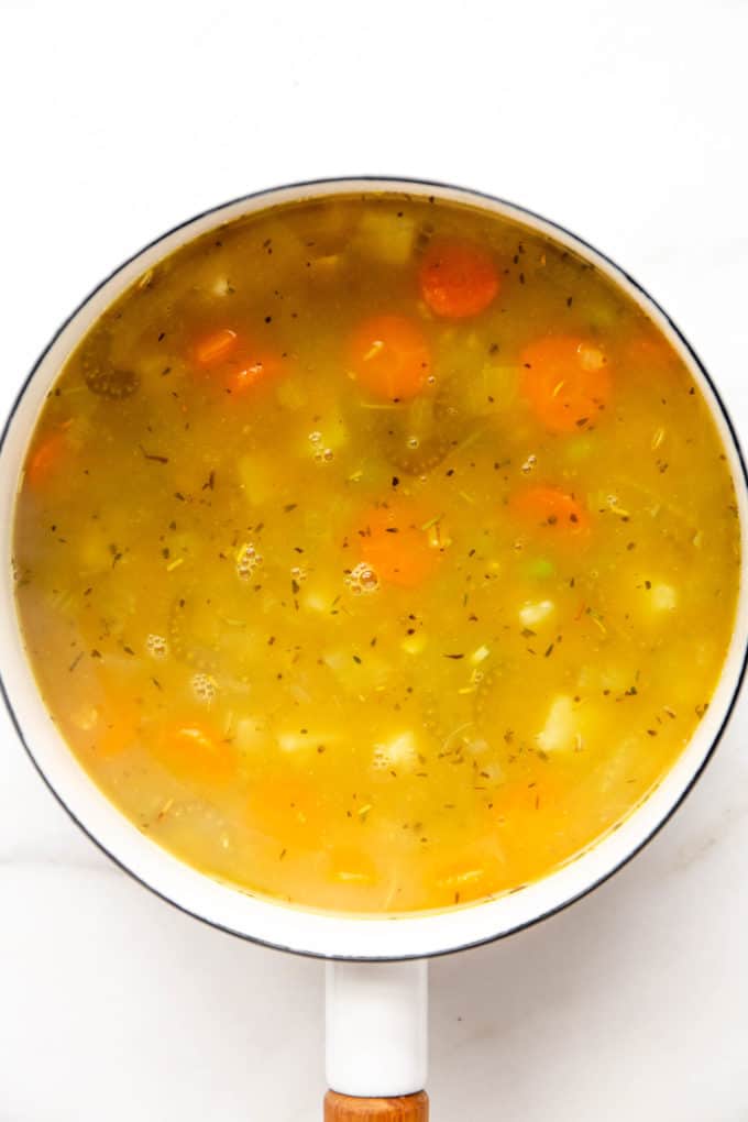 a pot of vegetable barley soup