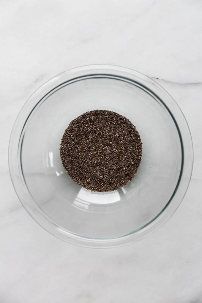 chia seeds in a clear mixing bowl