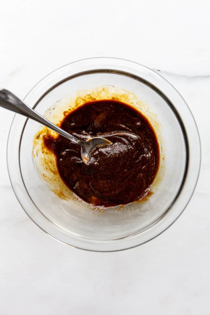 molasses, almond butter and maple syrup in a mixing bowl