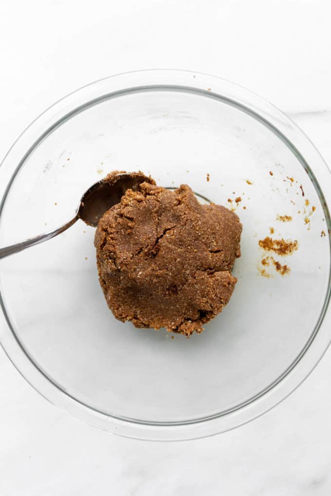gingerbread truffle dough in a clear mixing bowl