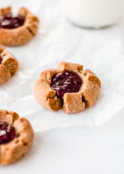 a peanut butter thumbprint cookie filled with jam