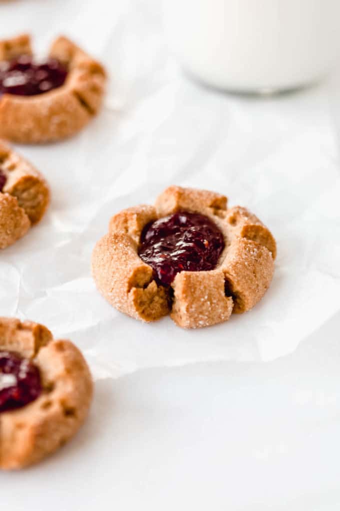 a peanut butter thumbprint cookie filled with jam